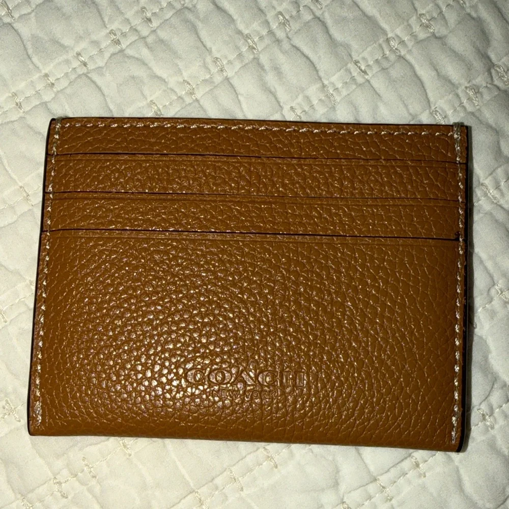 Coach excellent only